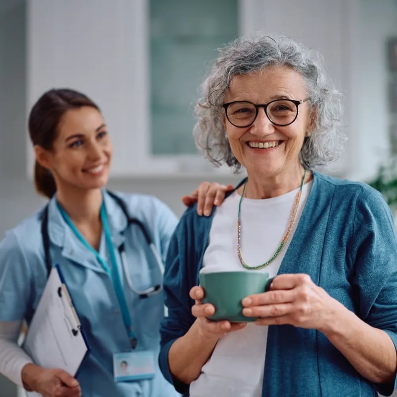 staff with senior volunteer