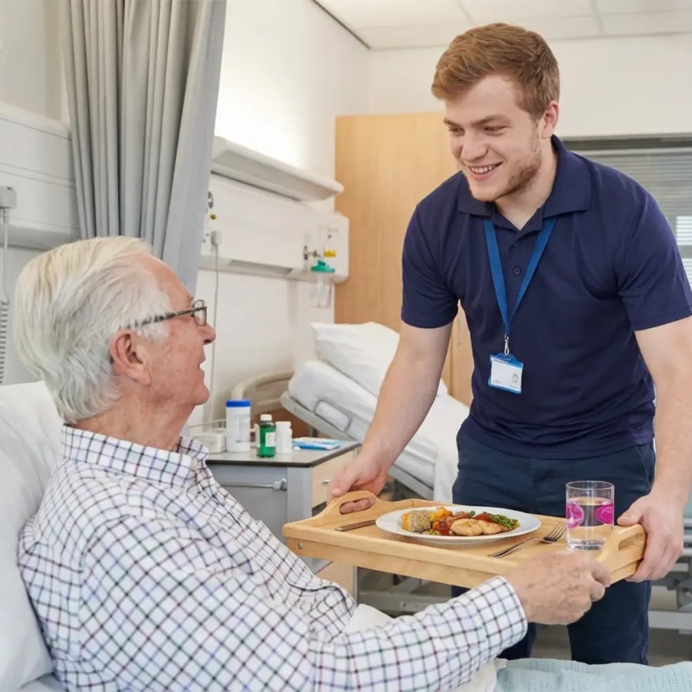 volunteer helping serve food