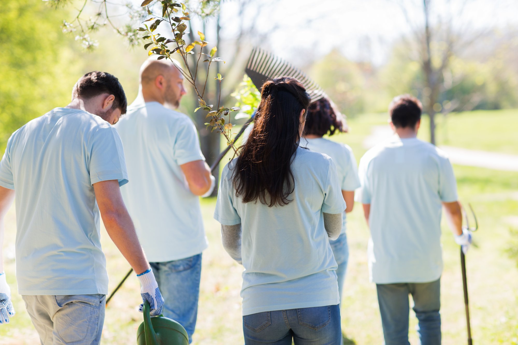 happy-volunteers-with-seedlings-and-garden-tools-2026-03-09-07-59-48-utc