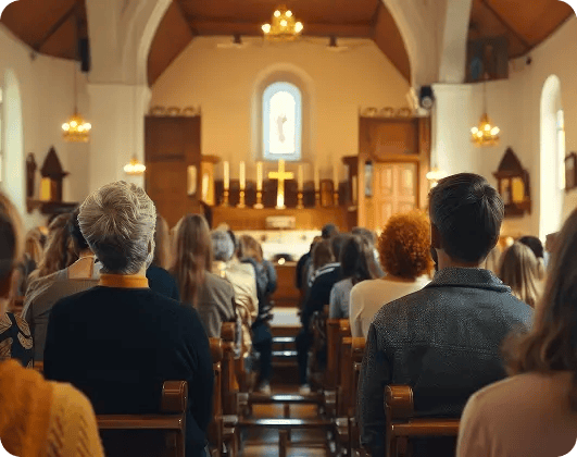 Group of people gathered in a church service, offering comfort and community support, symbolizing spiritual care in hospice settings.