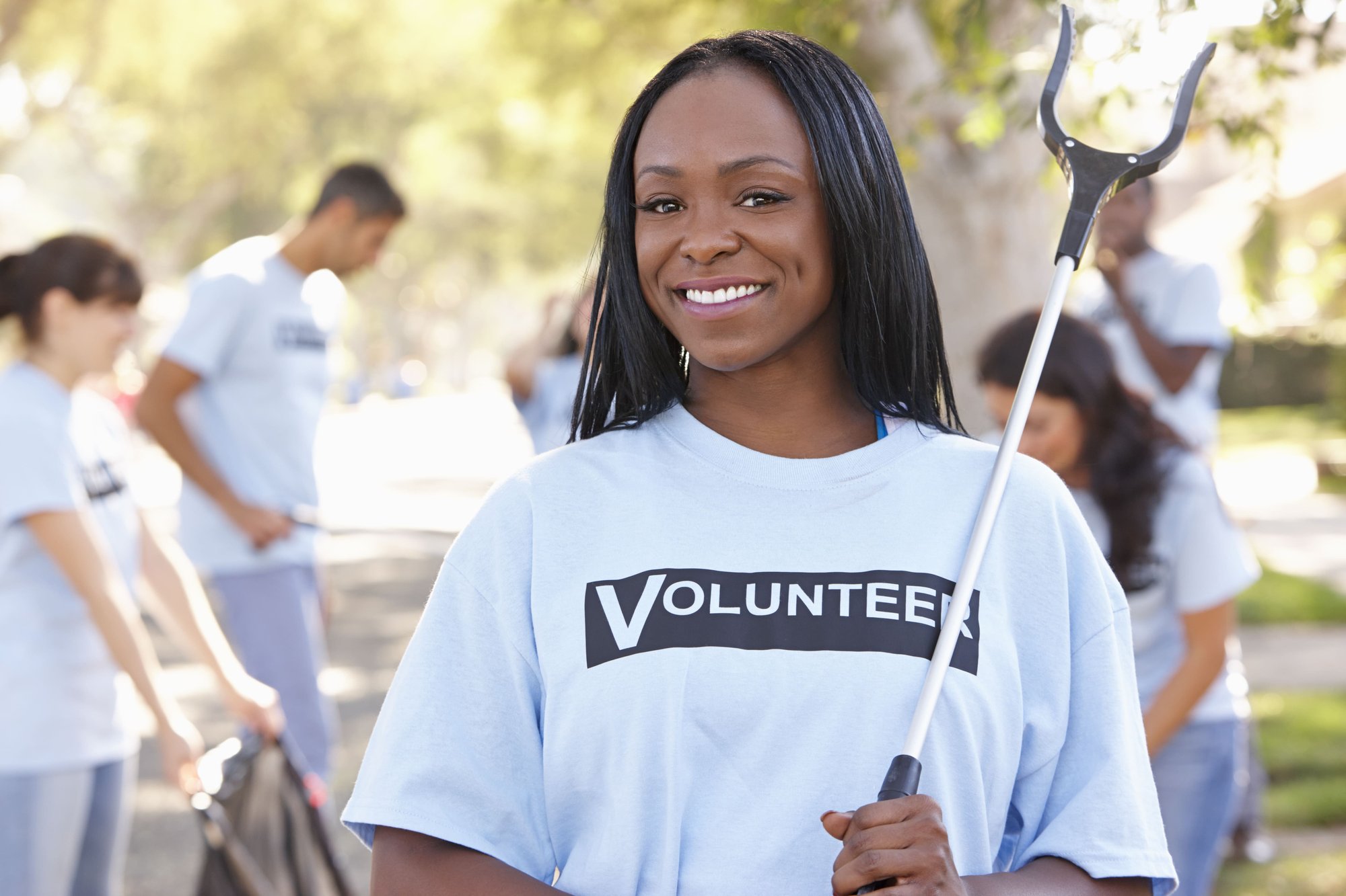 team-of-volunteers-picking-up-litter-in-suburban-s-2026-03-10-03-15-08-utc