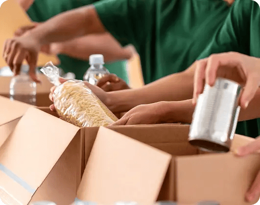 volunteers-packing-food-donation-boxes